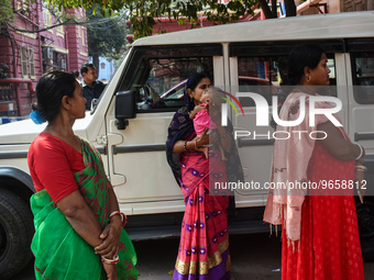 A woman playing with a toddler and waiting for treatment at a government-run hospital amid the spread of Adenovirus In Kolkata, India on 27...