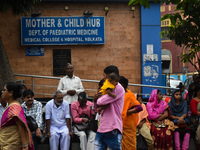 Patients and their relatives wait for treatment at a government-run hospital amid the spread of Adenovirus In Kolkata, India on 27 February...