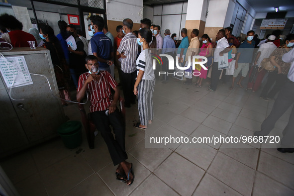 Patients wait for treatment at a National Hospital Colombo as health workers hold a work strike in Colombo on March 01, 2022. Number of trad...