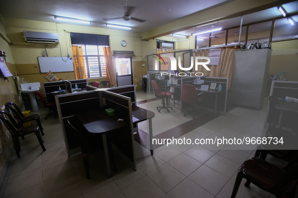 Worker walks through a deserted National Hospital Colombo as health workers hold a work strike in Colombo on March 01, 2022. Number of trade...