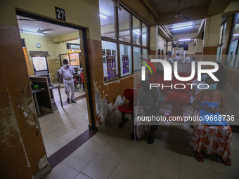 Worker walks through a deserted National Hospital Colombo as health workers hold a work strike in Colombo on March 01, 2022. Number of trade...