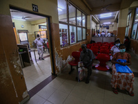 Worker walks through a deserted National Hospital Colombo as health workers hold a work strike in Colombo on March 01, 2022. Number of trade...