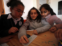 Palestinian female students in the Arduino Applications training at Spark for Innovation and Creativity. in Gaza City on February 28, 2023....