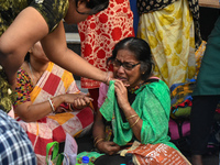 Patients' relatives mourns after a child died due to To Respiratory Infections with Adenovirus symptoms outside a Hospital in Kolkata, India...