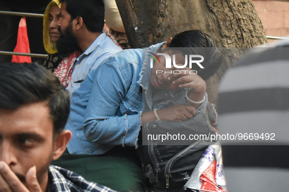 A woman mourns after her child died due to To Respiratory Infections with Adenovirus symptoms outside a Hospital in Kolkata, India on 1 Marc...