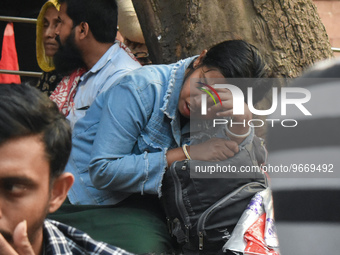 A woman mourns after her child died due to To Respiratory Infections with Adenovirus symptoms outside a Hospital in Kolkata, India on 1 Marc...