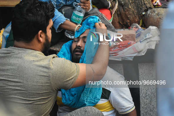 A person is consoled after his child died due to To Respiratory Infections with Adenovirus symptoms outside a Hospital in Kolkata, India on...