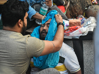 A person is consoled after his child died due to To Respiratory Infections with Adenovirus symptoms outside a Hospital in Kolkata, India on...