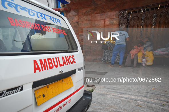 Patients and their relatives wait for treatment for suffering from fever and respiratory problems In outside an Emergency ward in a governme...