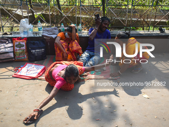 Patients' relatives mourn after a child died due to To Respiratory Infections outside a Hospital in Kolkata, India on 2 March 2023.  (