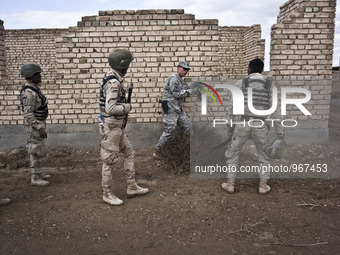 American military training with Iraqi soldiers during an exercise on approaching and clearing buildings in Baghdad, on January 8, 2015. The...