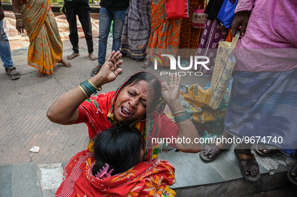 A woman reacts as the health condition of her eight-month-old grandson fluctuates, at a hospital in Kolkata, on March 02, 2023. Her grandson...