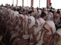 Palestinians during a mass wedding ceremony in Gaza City, on April 11, 2015. Nearly 200 Palestinian couples were married in a ceremony funde...