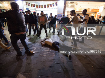 An injured man is lieing on the ground during a demonstration of Ethiopian Jews at RABIN Square in Tel Aviv on May 3, 2015.
A few thousands...