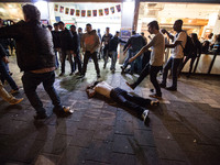 An injured man is lieing on the ground during a demonstration of Ethiopian Jews at RABIN Square in Tel Aviv on May 3, 2015.
A few thousands...