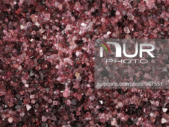 Uncut rubies at a gem's trader's house.Ninenty percent of the world's rubies, along with many other precious stones are found in this remote...