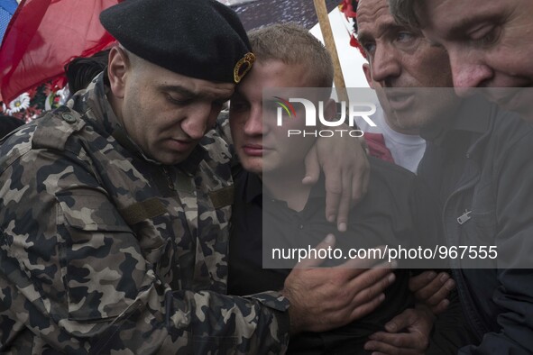 PRISTINA, KOSOVO-- May 26, 2015- Family members mourn for Mirsad Ndrecai, one of eight Kosovar men accused of being terrorists during a fune...