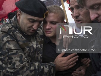 PRISTINA, KOSOVO-- May 26, 2015- Family members mourn for Mirsad Ndrecai, one of eight Kosovar men accused of being terrorists during a fune...