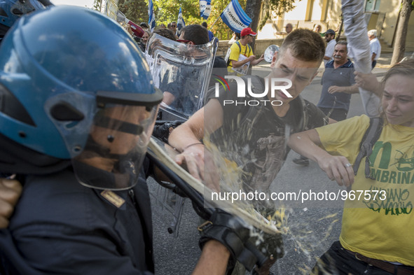 Demonstrators Clash with riot police following a demonstration, organized by antagonist to protest against the visits of Italian PM Matteo R...