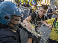 Demonstrators Clash with riot police following a demonstration, organized by antagonist to protest against the visits of Italian PM Matteo R...