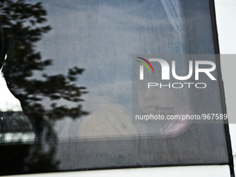 A girl looks out of a window in Edirne, Turkey on September 22, 2015. The European Union approves a plan to share 120,000 refugees across it...