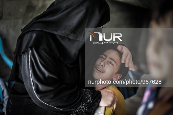 Relatives of Palestinian Ahmed al-Serhi, who was killed by Israeli forces the previous day in clashes at the border fence which separates th...