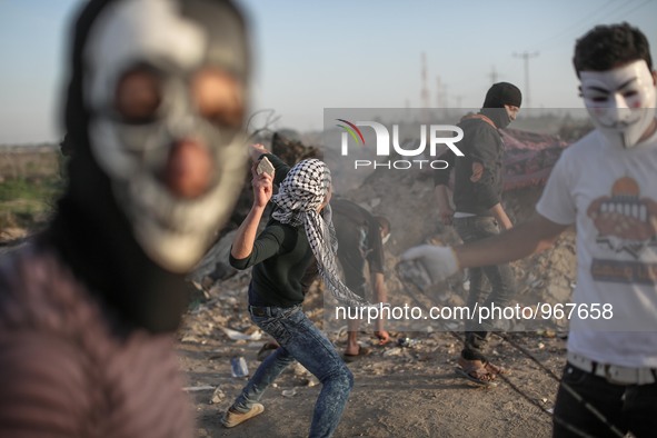 Palestinian protesters during clashes with Israeli security forces along the border with Israel on the eastern outskirts of Gaza City, on No...