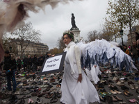 Action among thousands of shoes symbolising the hundred-of-thousands of people who were expected to attend the banned climate march during t...