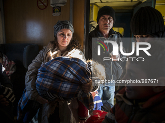 Immigrants from Afghanistan, Syria and Iraq boarded crowded trains from the southern Macedonian border towards the Serbian border, on Novemb...