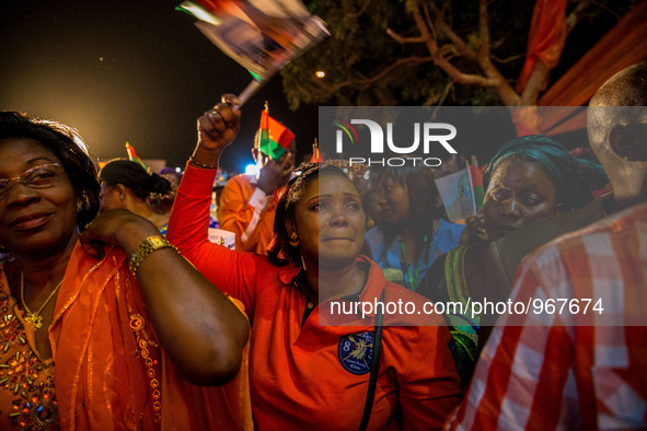 Crying MPP-militant listening to victory speech of Roch Marc Christian Kaboré, Ouagadougou, November 30th 2015 