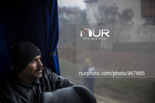 Dimitrovgrad, Serbia-- December 16, 2015--Muhammed Wais Pazhwak, 35, waiting inside the Belgrade bound bus parked outside the police registr...