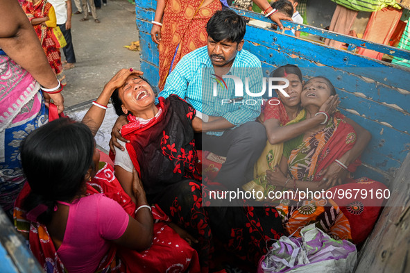 

Relatives of a child are reacting to the death of the child, who was suffering from respiratory problems, at a hospital in Kolkata, India,...