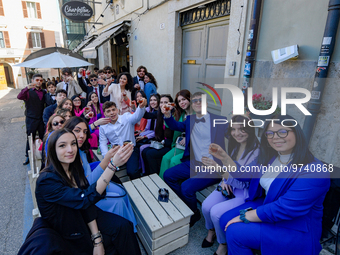 Students celebrate 100 days to the high-school leaving exams amid toasts and a mega-lunch in Rieti, Italy, on 13 March 2023.  (