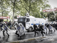 Turkish riot police use water cannons and tear gas to disperse protesters during a May Day demonstration on May 1, 2014 in Istanbul, Turkey....