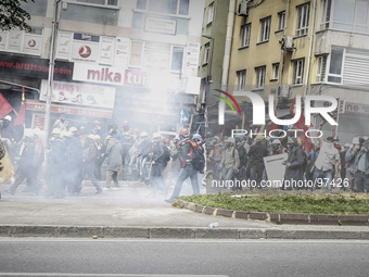 Clashes with riot police who prevent demonstrators from reaching Taksim Square in Istanbul for a May Day rally on May 1, 2014. Turkish polic...