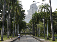 People running amid heavy air pollution of fine particulate matter (PM2.5) shrouds at Lumpini Park in Bangkok, Thailand, 14 March 2023. Seve...