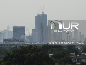 A general view shows high-rise buildings amid smoggy conditions due to air pollution in Bangkok, Thailand, 14 March 2023. Severe air polluti...