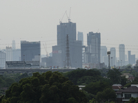 A general view shows high-rise buildings amid smoggy conditions due to air pollution in Bangkok, Thailand, 14 March 2023. Severe air polluti...