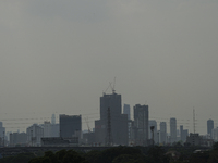 A general view shows high-rise buildings amid smoggy conditions due to air pollution in Bangkok, Thailand, 14 March 2023. Severe air polluti...