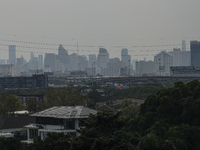 A general view shows high-rise buildings amid smoggy conditions due to air pollution in Bangkok, Thailand, 14 March 2023. Severe air polluti...