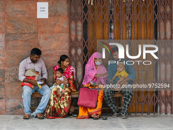 Families are seen outside a fever clinic of a hospital in Kolkata , India , on 16 march 2023 . Cases of respiratory distress in children's s...