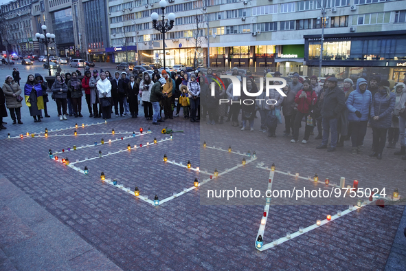 People put up the inscription ''CHILDREN'' during a commemoration of the victims at the Mariupol Drama Theater. Such an inscription was made...