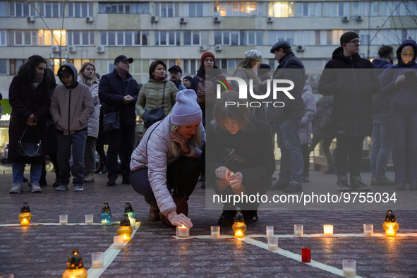 People put up the inscription ''CHILDREN'' during a commemoration of the victims at the Mariupol Drama Theater. Such an inscription was made...