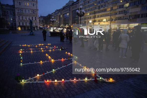 People put up the inscription ''CHILDREN'' during a commemoration of the victims at the Mariupol Drama Theater. Such an inscription was made...