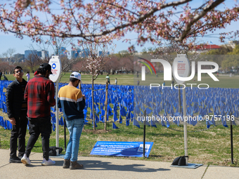 People view a visual exhibit organized by the Fight Colorectal Cancer organization on the National Mall in Washington, D.C. on March 16, 202...