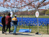 People view a visual exhibit organized by the Fight Colorectal Cancer organization on the National Mall in Washington, D.C. on March 16, 202...