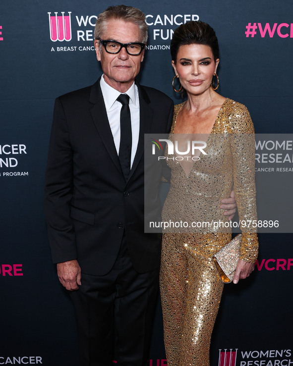 American actor, author and entrepreneur Harry Hamlin and wife/American actress, television personality and model Lisa Rinna arrive at The Wo...