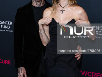 American singer and songwriter Adam Levine of American pop rock band Maroon 5 and wife/Namibian model Behati Prinsloo arrive at The Women's...