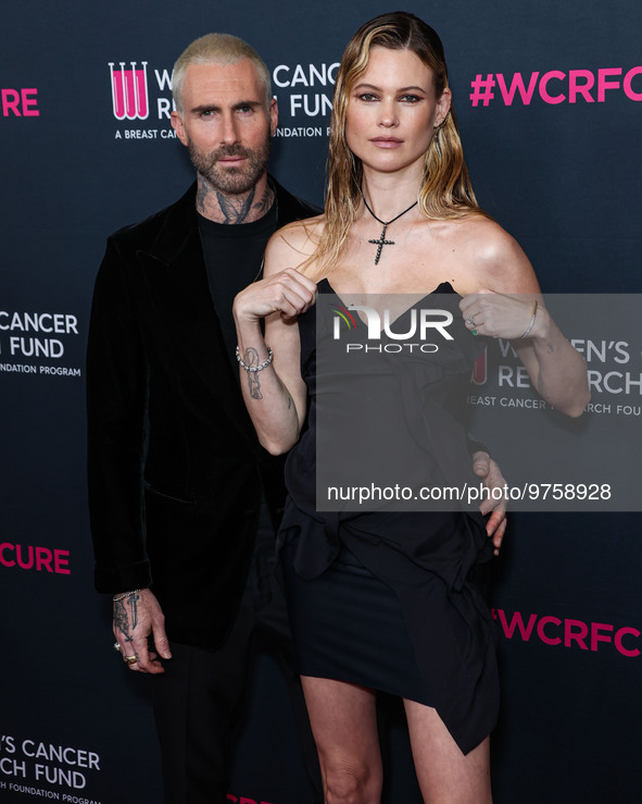 American singer and songwriter Adam Levine of American pop rock band Maroon 5 and wife/Namibian model Behati Prinsloo arrive at The Women's...