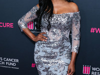 American model, reality television personality and actress Cynthia Bailey arrives at The Women's Cancer Research Fund's An Unforgettable Eve...